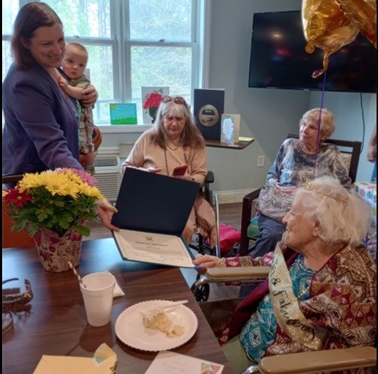 Mayor Hollie Berry presents certificate to Audrey Conner for 100th Birthday